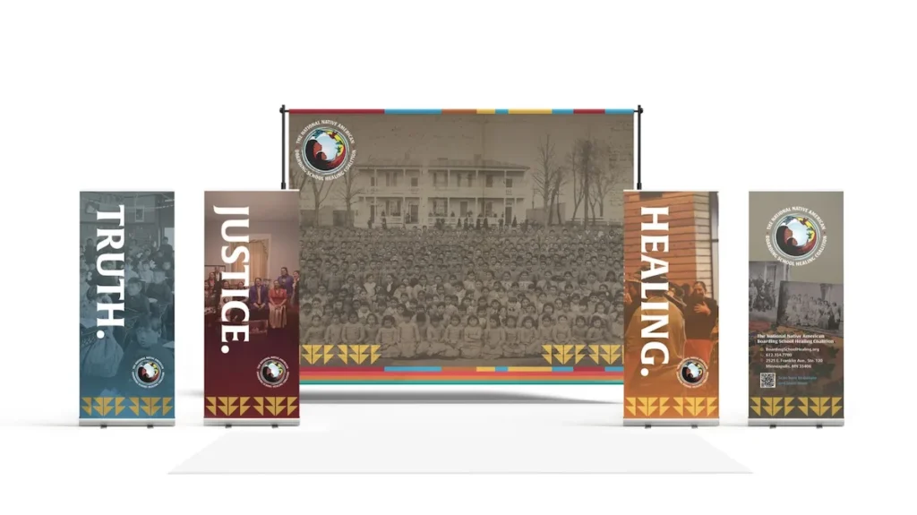 Eye-catching booth signage for The National Native American Boarding School Healing Coalition
